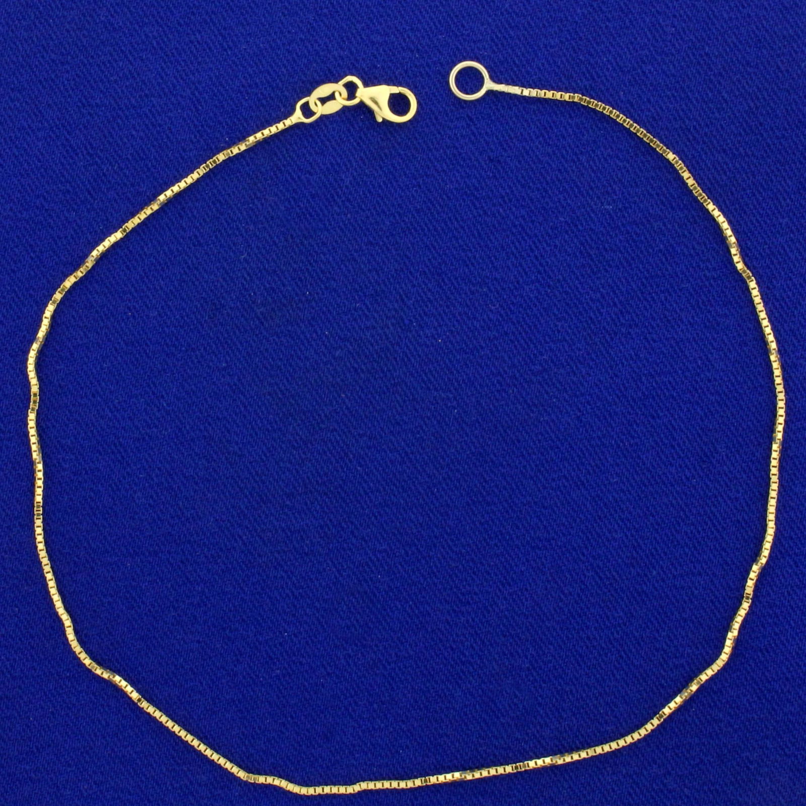 Italian Made Box Link Chain Anklet in 14K Yellow Gold: In 14K Yellow Gold. 10 1/2 inches long. 0.8mm wide. 1.5g