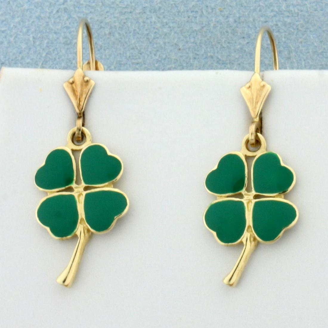 Enamel Four-Leaf Clover Earrings in 14K Yellow Gold: In 14K Yellow Gold. 1 1/4 inches long, 1/2 inch wide. 2.1g.