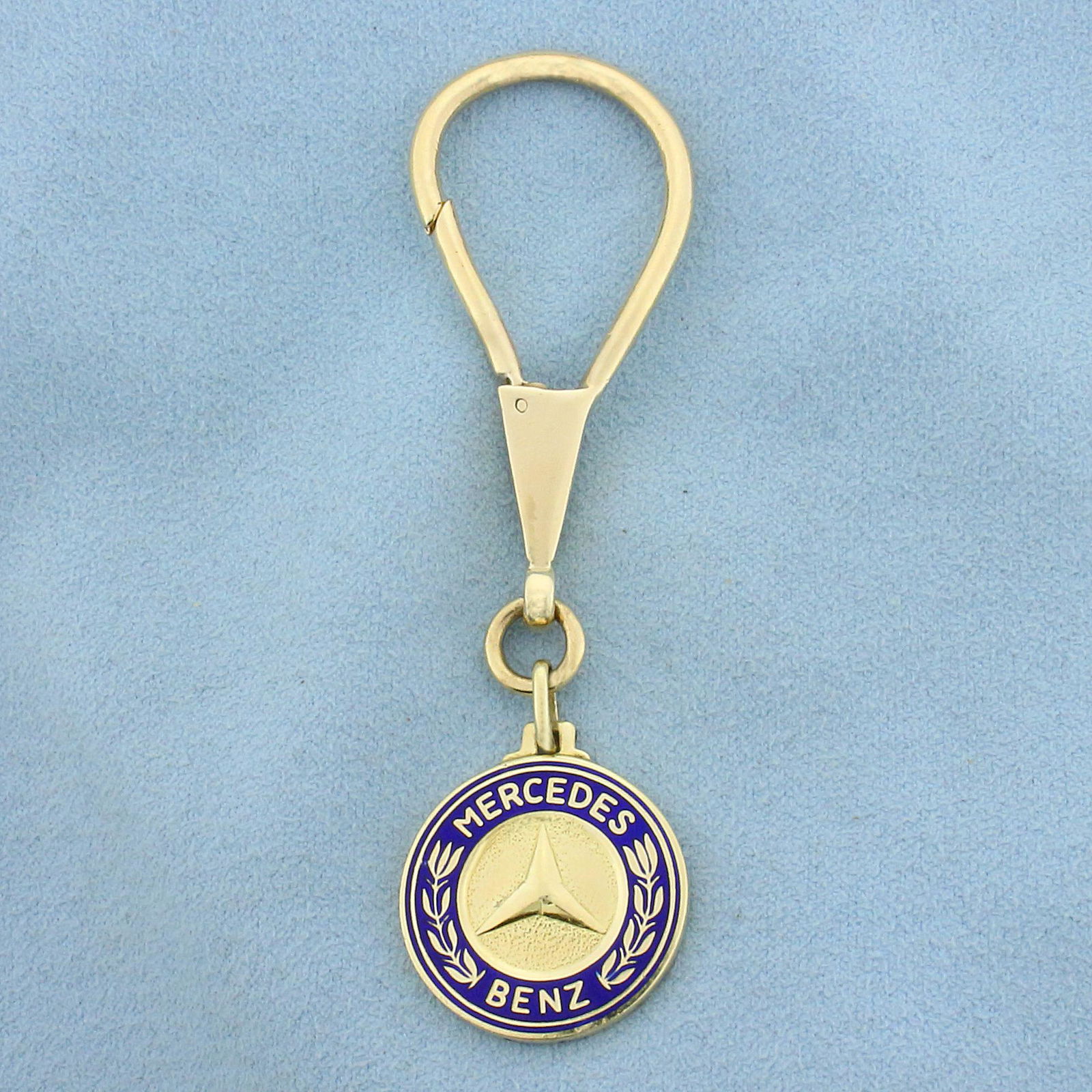 Mercedes-Benz Keychain in Solid 14K Yellow Gold: In 14K Yellow Gold. 3 3/8 inches long, 1 inch wide. 18.2g.