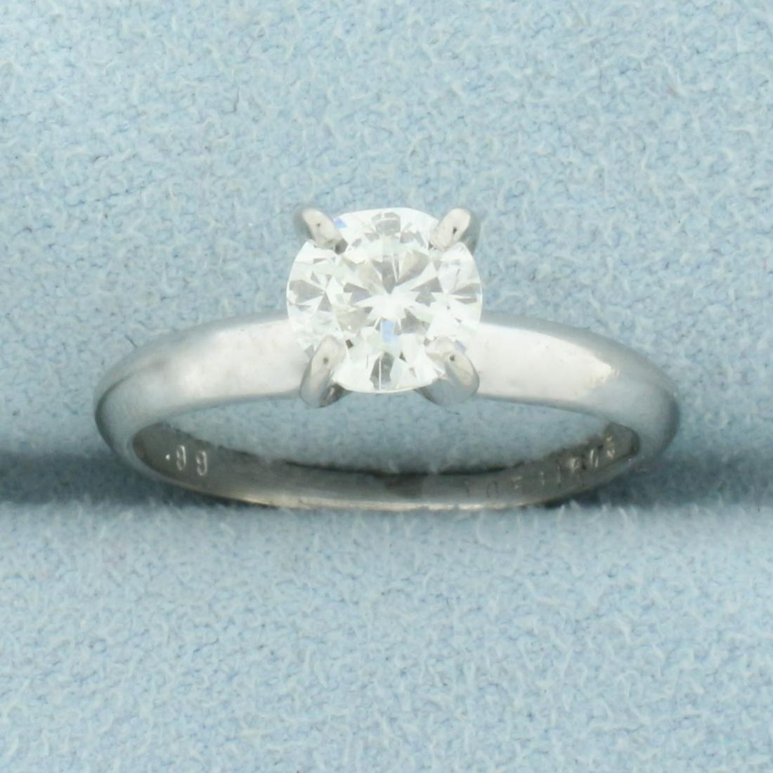 1ct Diamond Solitaire Engagement Ring in Platinum: In Platinum. Contains a high quality .99ct round brilliant cut Diamond , SI clarity/K color, completely eye clean, great cut for lots of sparkle . Size 5 1/2. 3.6g