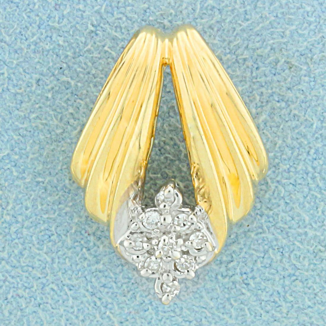 Vintage Diamond Pendant or Slide in 14K Yellow Gold: In 14K Yellow Gold. Contains nine high quality .01ct round Diamonds, VS Clarity/H Color. 7/8 inch long. 5/8 inch wide. Opening for chain/omega is large - can fit 10mm by 5mm chain or omega necklace. 3