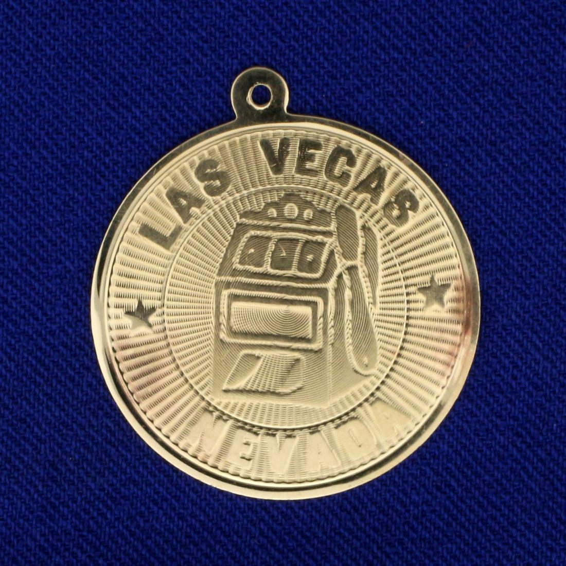 Las Vegas Circle Pendant in 14K Yellow Gold: In 14K Yellow Gold. Blank back so can inscribe name or date. 1 1/8 inches long. 2.0g