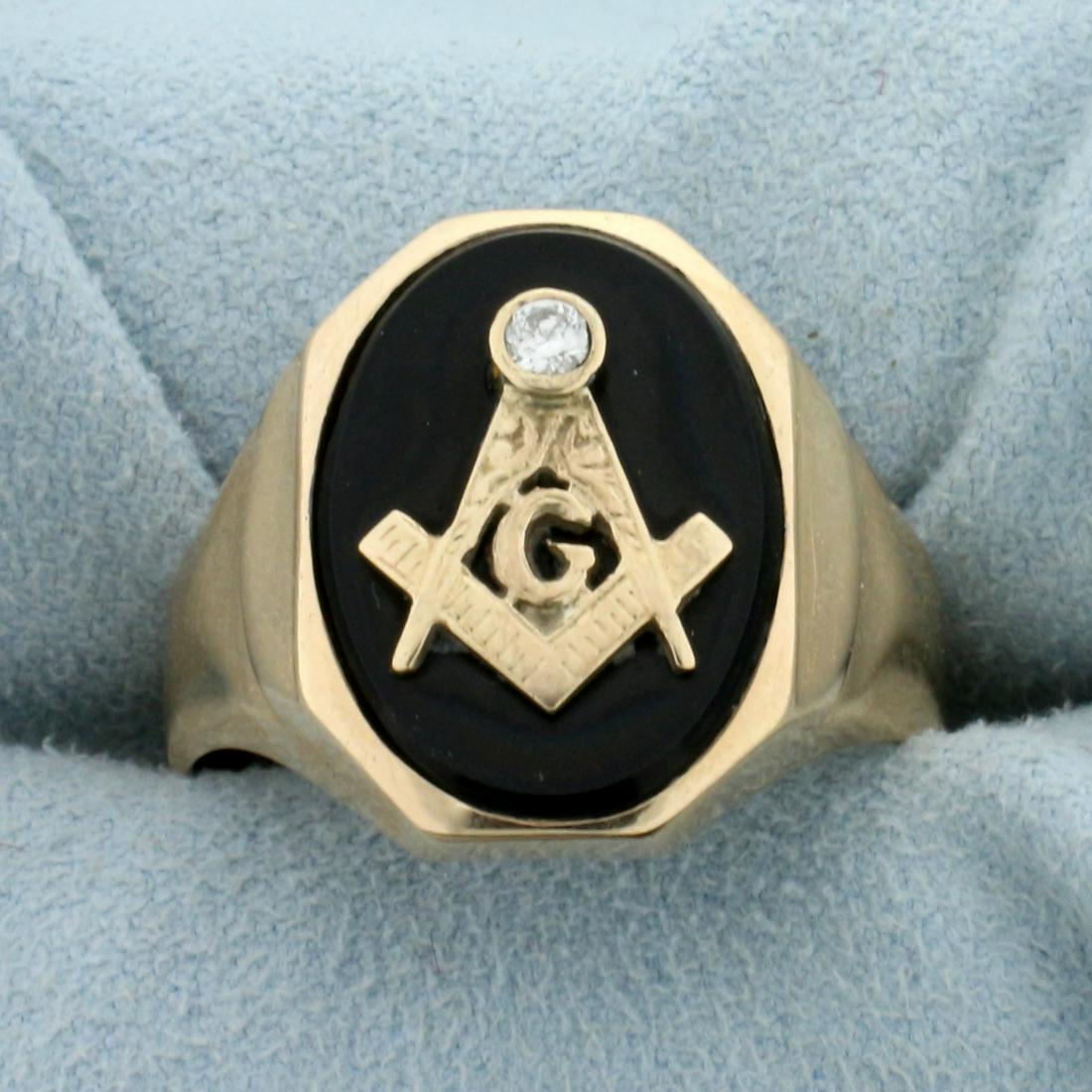 Masonic Diamond and Onyx Ring in 14K Yellow Gold: In 14K Yellow Gold. Contains one high quality .05ct Diamond, VS clarity/H color. Size 12 1/2. 7.2g