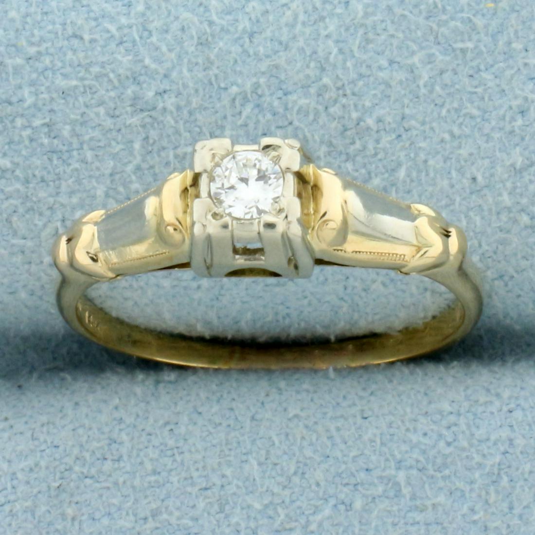Solitaire Diamond Engagement Ring in 14K Yellow and: In 14K Yellow and White Gold. Contains one high quality .1ct round brilliant Diamond, VS clarity/H color. Size 7 1/4. 2.0g.