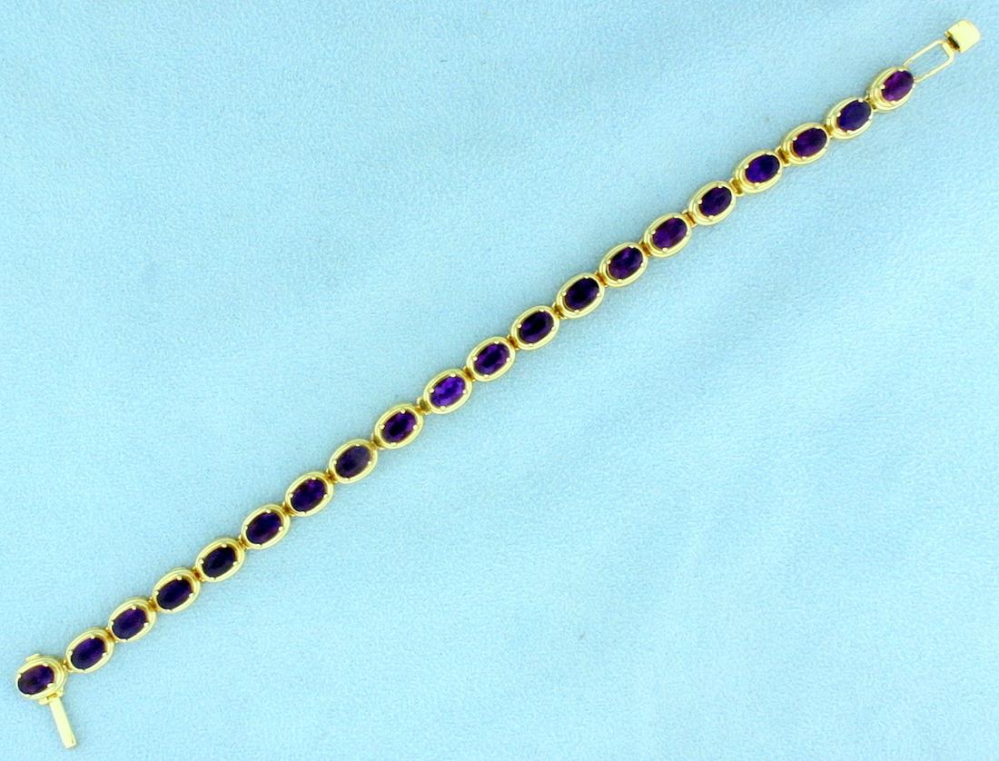 10ct TW Amethyst Tennis Bracelet in 14k Yellow Gold: In 14k yellow gold. Contains 10cts of very high quality amethyst gemstones with deep royal purple color and excellent clarity . 16.1g.