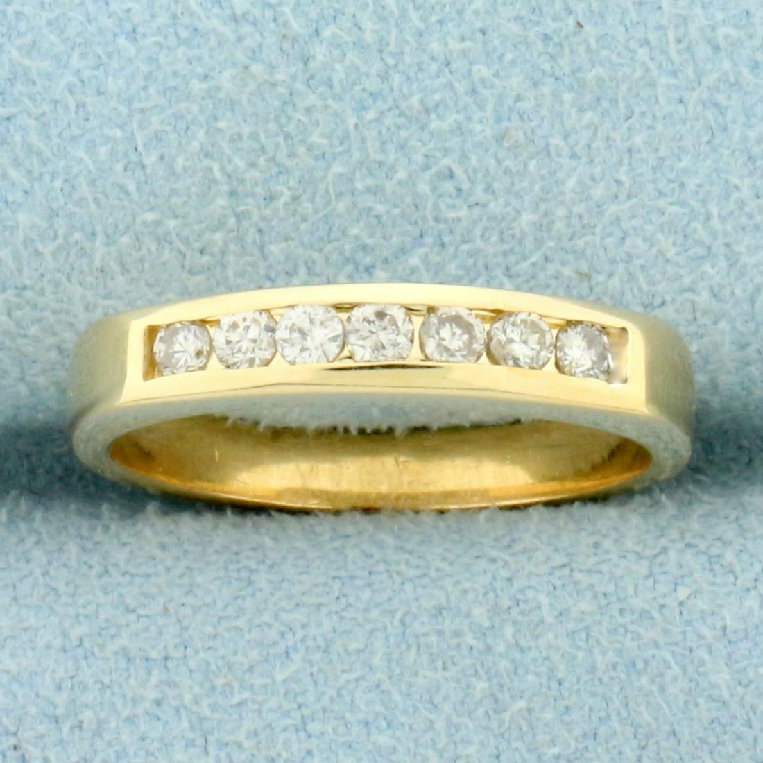 Diamond Wedding or Anniversary Band Ring in 14K Yellow: In 14K Yellow Gold. Contains seven high quality diamond, 1/4ct TW, SI clarity/H color. Size 6. 3.1g.