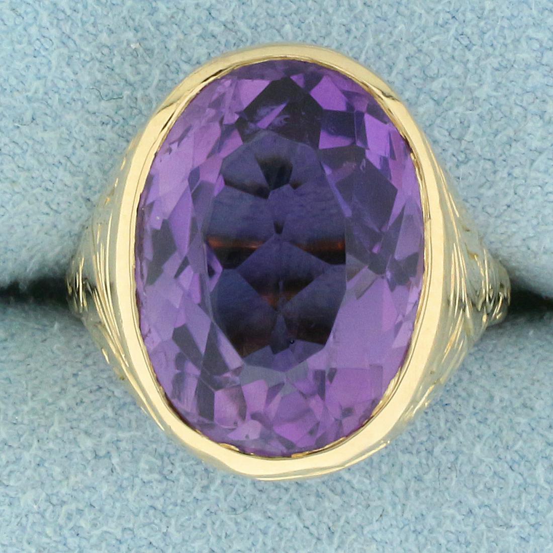 Vintage 8ct Amethyst Solitaire Ring in 14K Yellow Gold: In 14K Yellow Gold. Contains a high quality natural 15 x 11mm oval cut Amethyst gemstone with vibrant purple color and excellent clarity. Size 4 3/4. 9.4g.