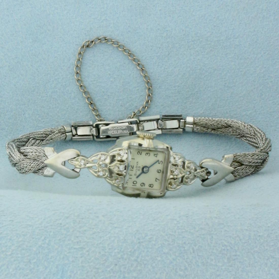 Antique Womens Bulova Windup Wrist Watch With Solid 14k: Case in solid 14k White gold. Band is gold filled. Windup movement runs great, watch in great overall condition with minimal scratching on band or case. Case is 17mmx15mm. Contains twelve high quality