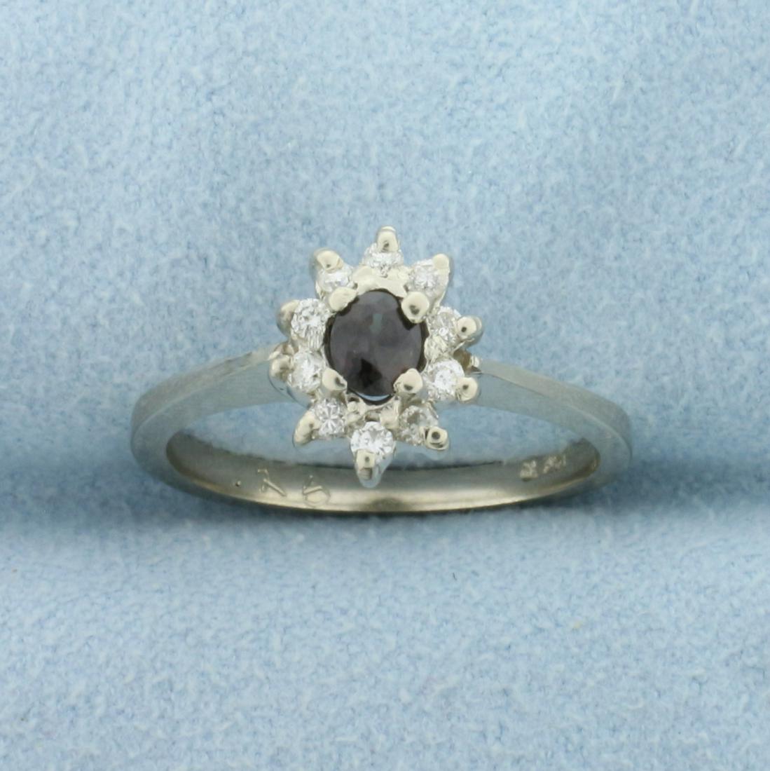 Natural Alexandrite and Diamond Ring in 14K White Gold: In 14K White Gold. Contains a high quality natural1/4ct Alexandrite gemstone with dramatic color change from green to purple/red depending on lighting conditions and excellent clarity. Also contains t