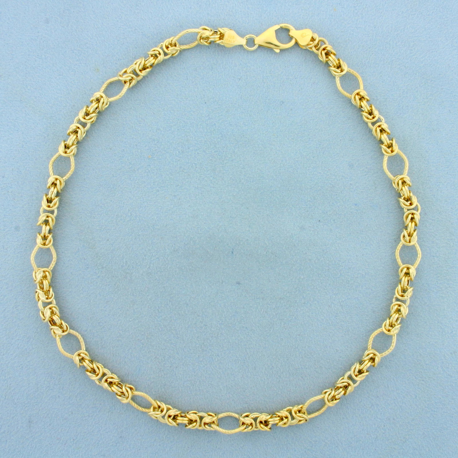 Italian Made 16 Inch Byzantine Link Chain Necklace in: In Gold Plated Sterling Silver. Has lobster clasp. 16 inches long. 2.58mm wide. 18.1g