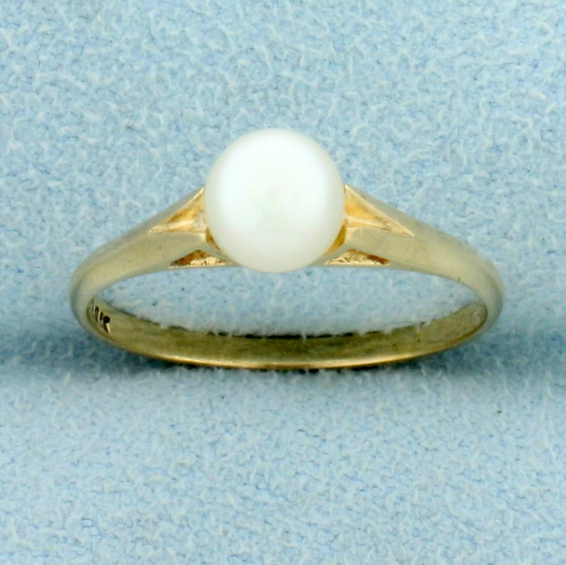 Cultured Pearl Solitaire Ring in 10K Yellow Gold: In 10K Yellow Gold. Contains a high quality 5.8mm Cultured Pearl with great color and high luster. Size 6 3/4. 1.5g