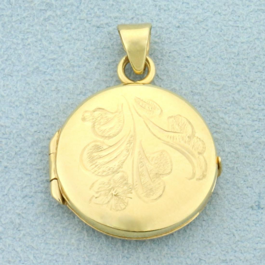 Italian Made Vintage Etched Locket Pendant in 14K: In 14K Yellow Gold. 1 inch long including bale. 3/4 inch wide. 4.0g