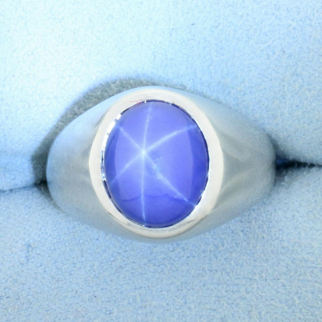 Mens Star Sapphire Solitaire Ring In 14K White Gold: In 14k White Gold. Contains one High Quality natural 11.5x910mm Star Sapphire gemstone with intense "star". Size 10. 12.7g