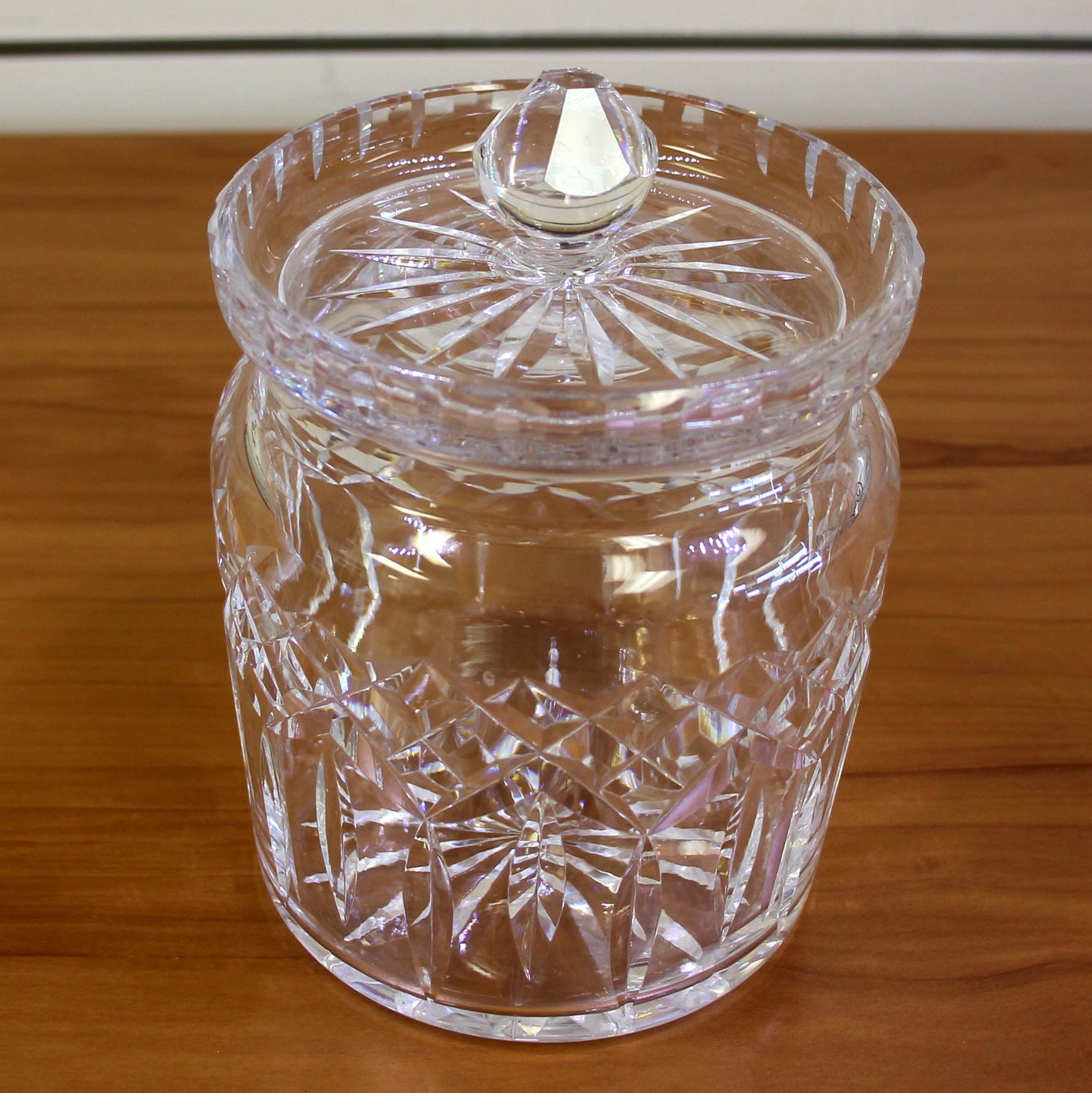 Waterford Crystal Lismore Biscuit Barrel with Lid: 6 inches tall. 5 inches wide. 4 3/4 inch diameter at opening. No defects.