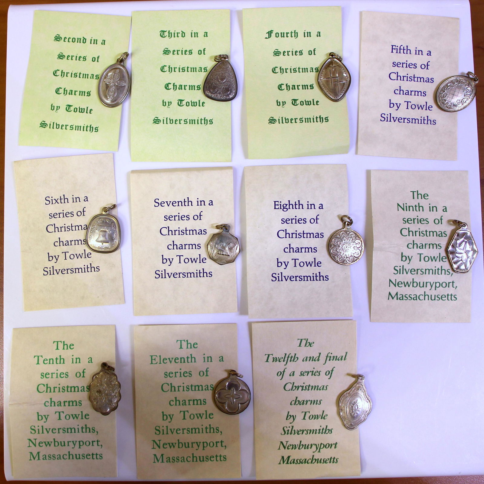 Towle Sterling Silver 12 Days of Christmas Reversable: In .925 Sterling Silver. Contains a Charm bracelet along with 12 charms, all new in original boxes.