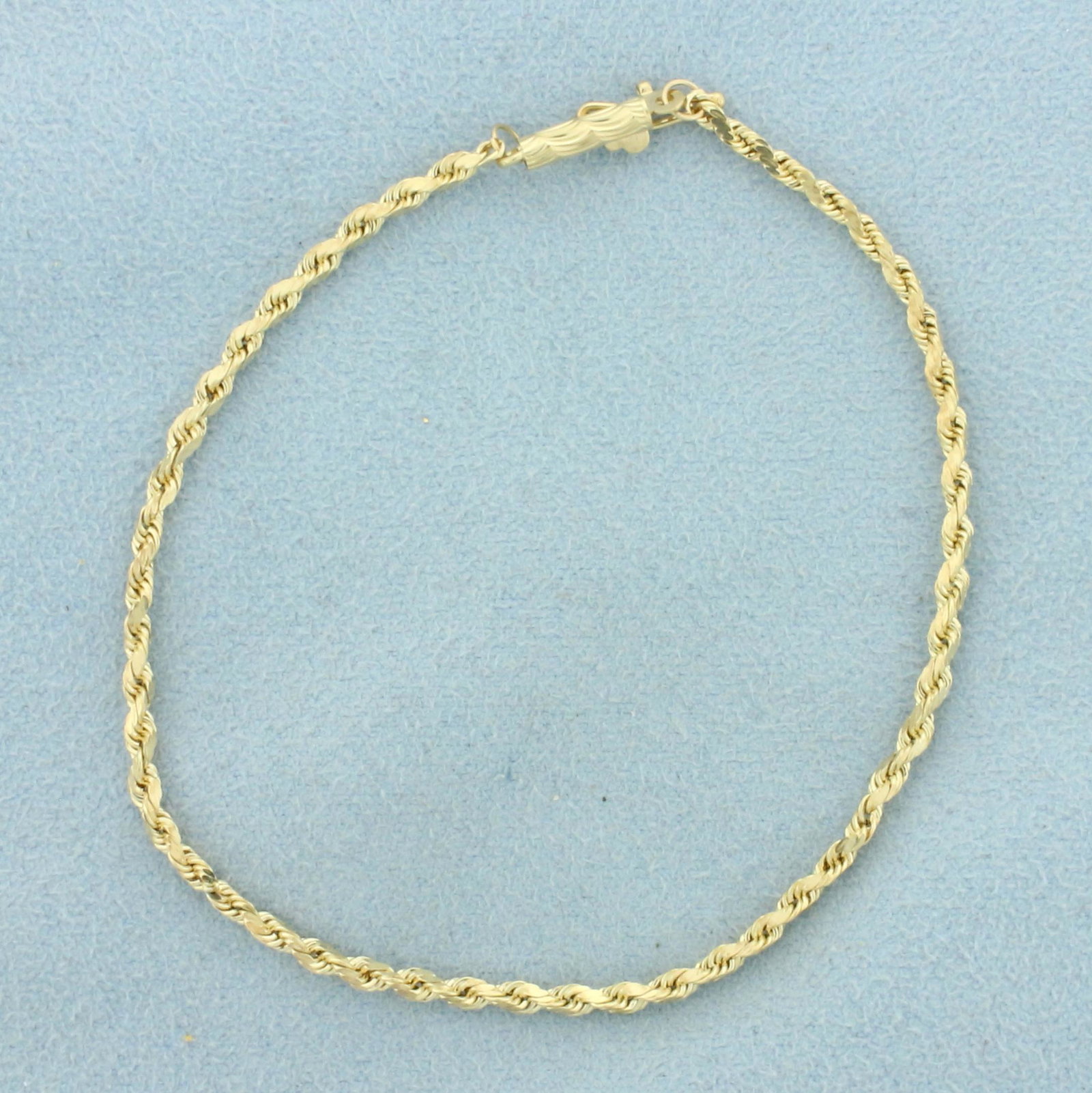 7 Inch Rope Style Chain Bracelet in 14K Yellow Gold: In 14K Yellow Gold. Safety clasp. 7 inches long. 1.6mm wide. 1.3g