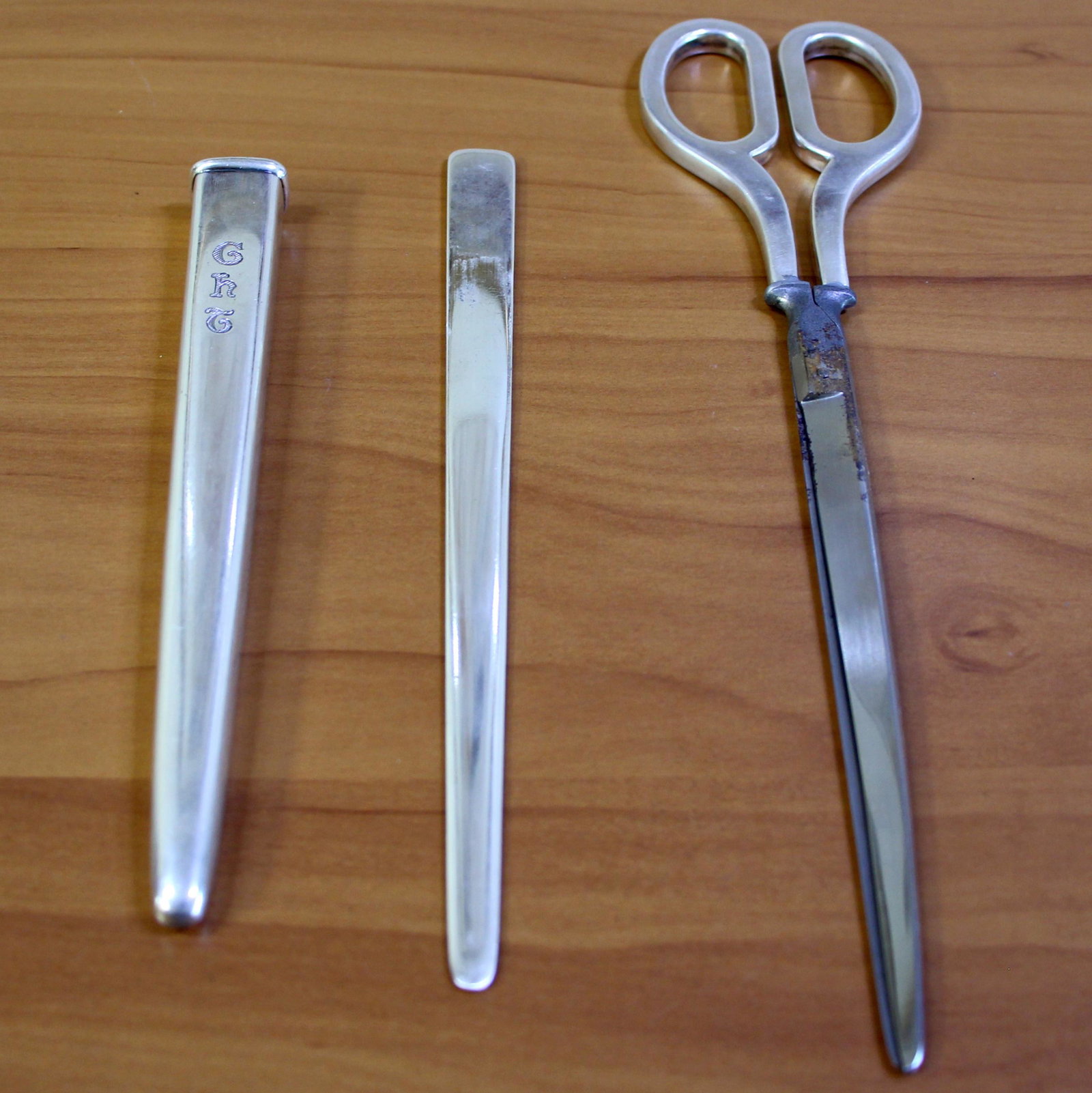 Tiffany Antique Co. Sterling Silver Scissors, Letter: In .925 Sterling Silver. Marked "Tiffany & Co. Makers" "21912" on all three pieces. Art Deco time period made in 1932, monogramed. 179.8g