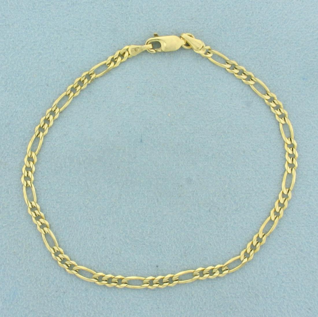 Italian Made 8 Inch Figaro Link Chain Bracelet in 14K: In 14K Yellow Gold. Lobster clasp. 8 inches long. 3.1mm wide. 3.4g
