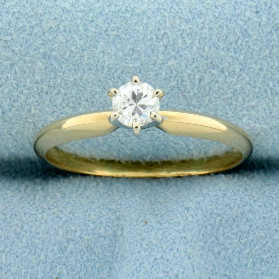 1/3ct Diamond Solitaire Engagement Ring in 14K Yellow: In 14K Yellow Gold. Contains one high quality 1/3ct diamond, VS clarity/H color. Size 10. 2.8g