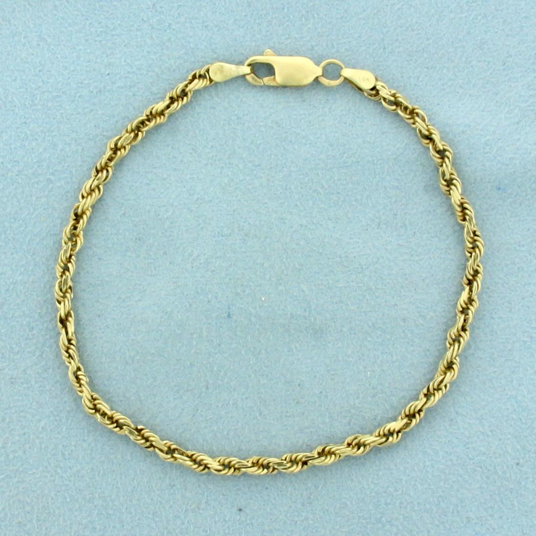 7 1/2 Inch Rope Style Chain Bracelet in 14K Yellow Gold: In 14K Yellow Gold. Lobster clasp. 7 1/2 inches long. 3mm wide. 5.4g