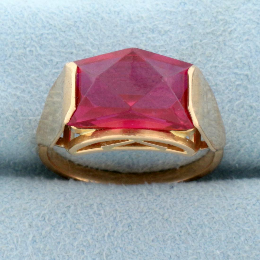 Unique Vintage Lab Ruby Ring in 14K Rose Gold: In 14K Rose Gold. Contains a large 15 x 8mm Lab Ruby with vibrant ruby red color and excellent clarity. Ruby is cut in unique diamond pattern. Size 9 1/2. 6.2g.