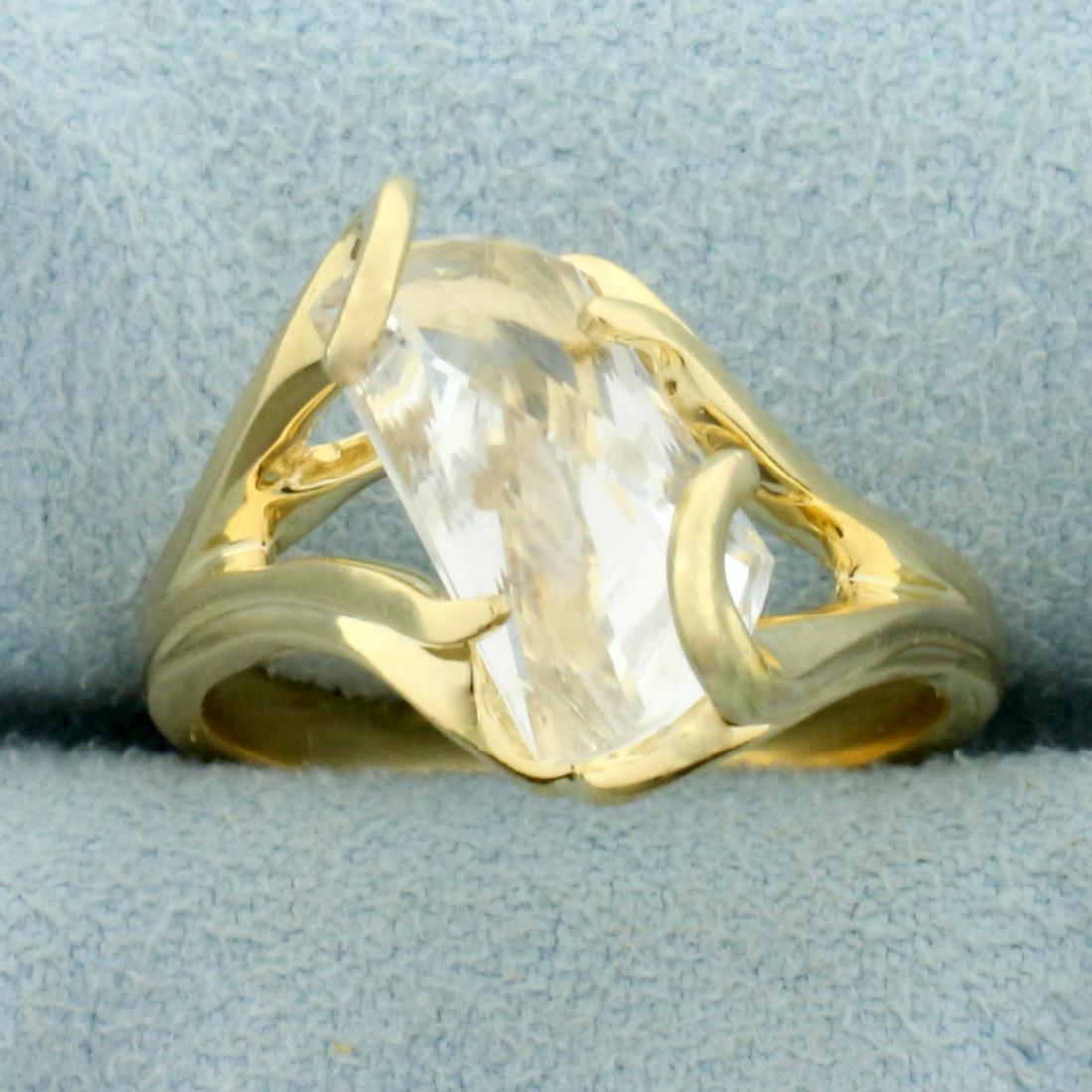 Designer Strellman White Sapphire Solitaire Ring in 14K: In 14K Yellow Gold. Contains one high quality natural 12x6.5mm unique fancy cut White Sapphrie gemstone with excellent clarity. Size 7. 5.7g
