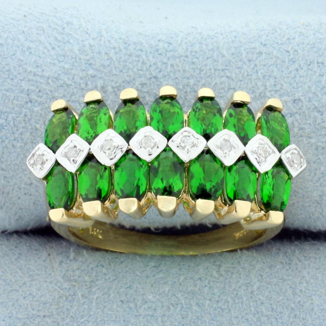 3.5ct TW Tsavorite and Diamond Ring in 14K Yellow Gold: In 14K Yellow Gold. Contains fourteen high quality natural 5x3mm oval Tsavorite gemstones with vibrant emerald green color and excellent clarity. Also contains eight high quality .01ct Diamonds. Size