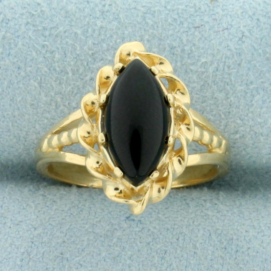 Vintage Onyx Solitaire Ring in 14K Yellow Gold: In 14K Yellow Gold. Contains one high quality natural 12x6mm marquise cut Onyx gemstone. Size 6 1/2. 4.4g