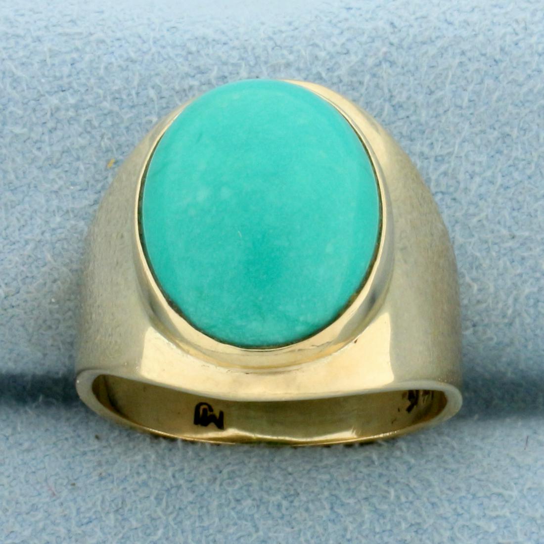 10ct Persian Turquoise Solitaire Ring in 14K Yellow: In 14K Yellow Gold with Rose Undertones. Contains one 16x13mm cabochon cut high quality Persian Turquoise gemstone with vibrant color and no matrix. Size 8. 8.8g.