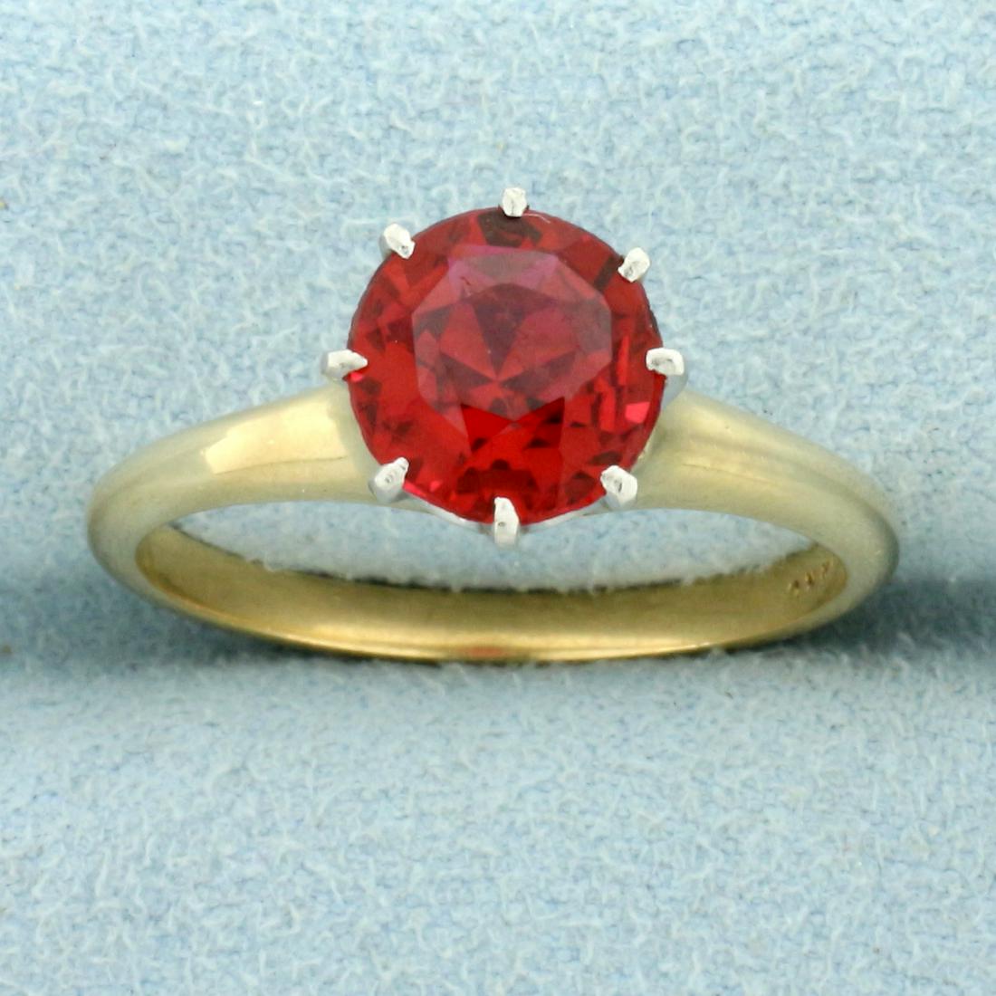 2ct Solitaire Rubellite Garnet Ring in 14K Yellow Gold: In 14K Yellow Gold. Contains one high quality natural 2ct rubellite garnet gemstone with intense ruby red color and excellent clarity. Size 10. 5.2g