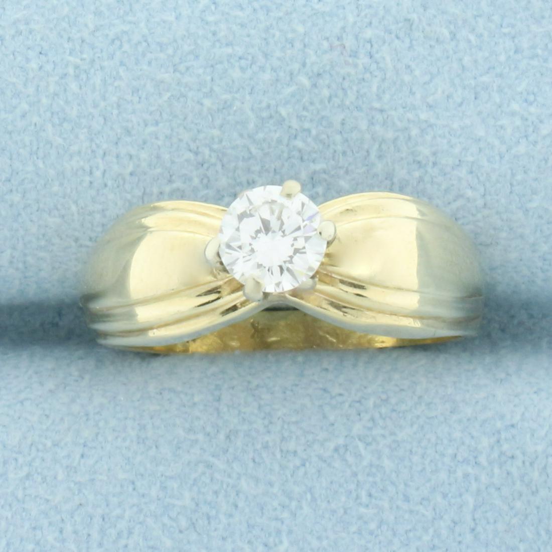 Vintage .4ct Diamond Solitaire Engagement Ring in 14K: In 14K Yellow Gold. Contains one very high quality .4ct round brilliant cut Diamond, VS clarity/F color, excellent cut for lots of sparkle. Size 5 3/4. 4.3g.