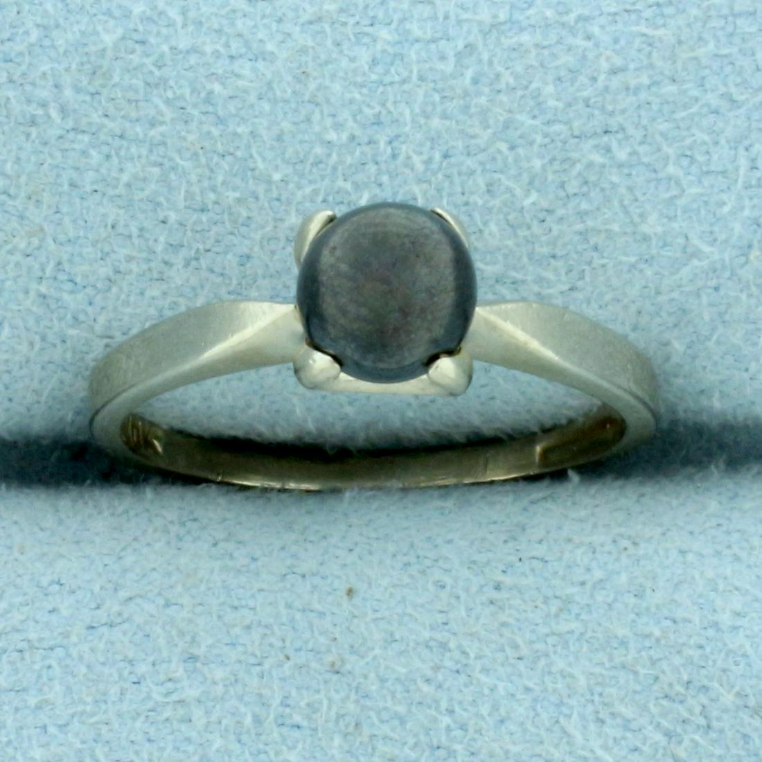 Black Pearl Solitaire Ring in 10K White Gold: In 10K White Gold. Contains one high quality natural 5.6mm black cultured pearl. Size 6. 1.8g