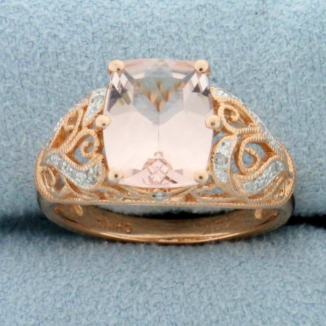 3ct TW Morganite and Diamond Ring in 10K Rose Gold: In 10K Rose Gold. Contains one high quality 10x8mm 3ct Morganite gemstone with beautiful salmon color and excellent clarity. Also contains fourteen high quality 1/2pt Diamonds. Size 7 1/4. 3.8g