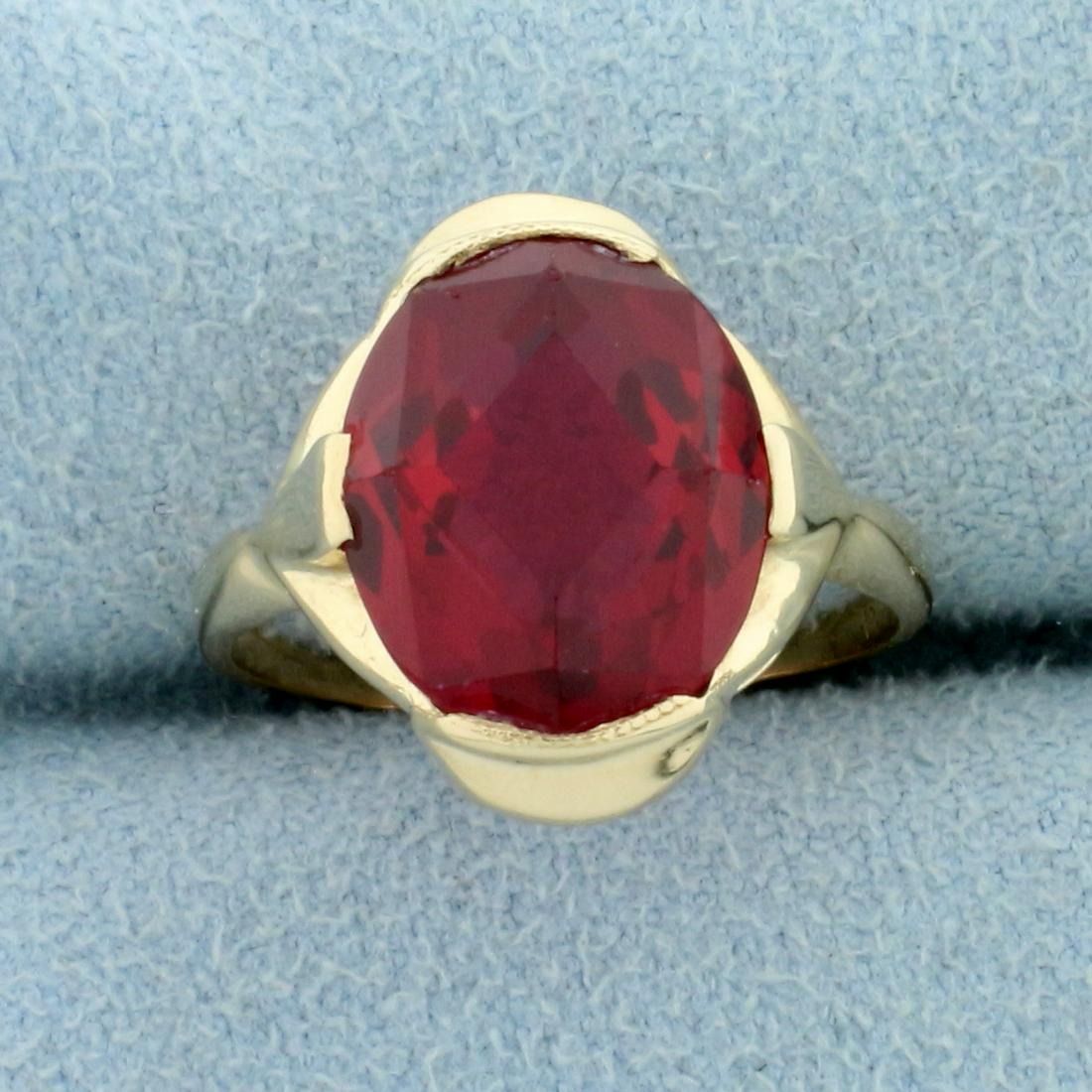 Antique 5CT Lab Ruby Solitaire Ring in 10K Yellow Gold: In 10K Yellow Gold. Contains one high quality lab-created 12x10mm oval Ruby gemstone with vibrant ruby red color and excellent clarity. Size 5 3/4. 3.4g.