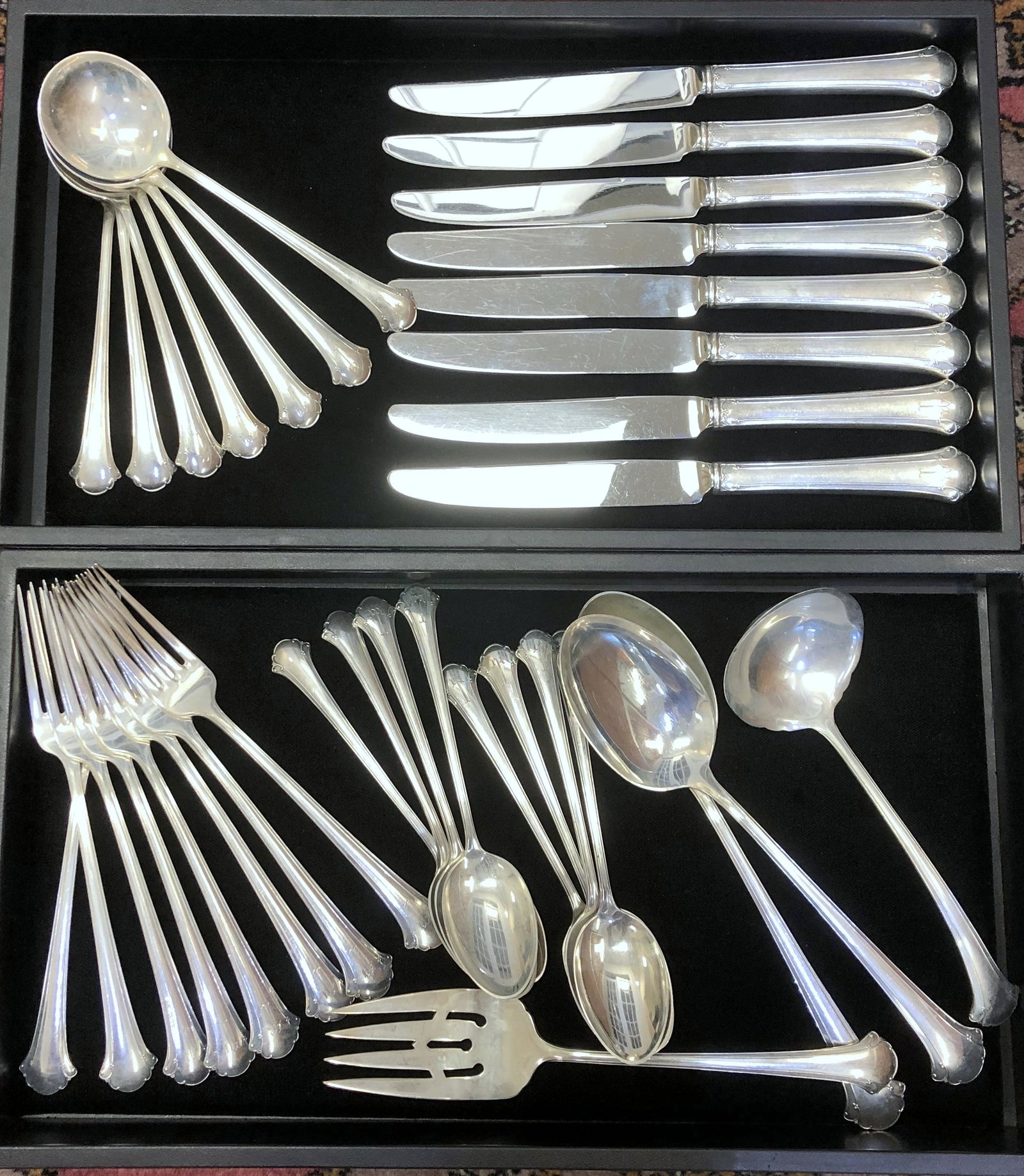 51 Piece Set Towle Chippendale Sterling Silver Flatware: In .925 Sterling Silver-- Most pieces have subtle 'T' monogram. Contains eight forks-7 3/8". Seven round bowl cream soup spoons-6.5". Eight teaspoons-6 1/8".Eight HH Knives-8 3/4". Eight salad forks-6