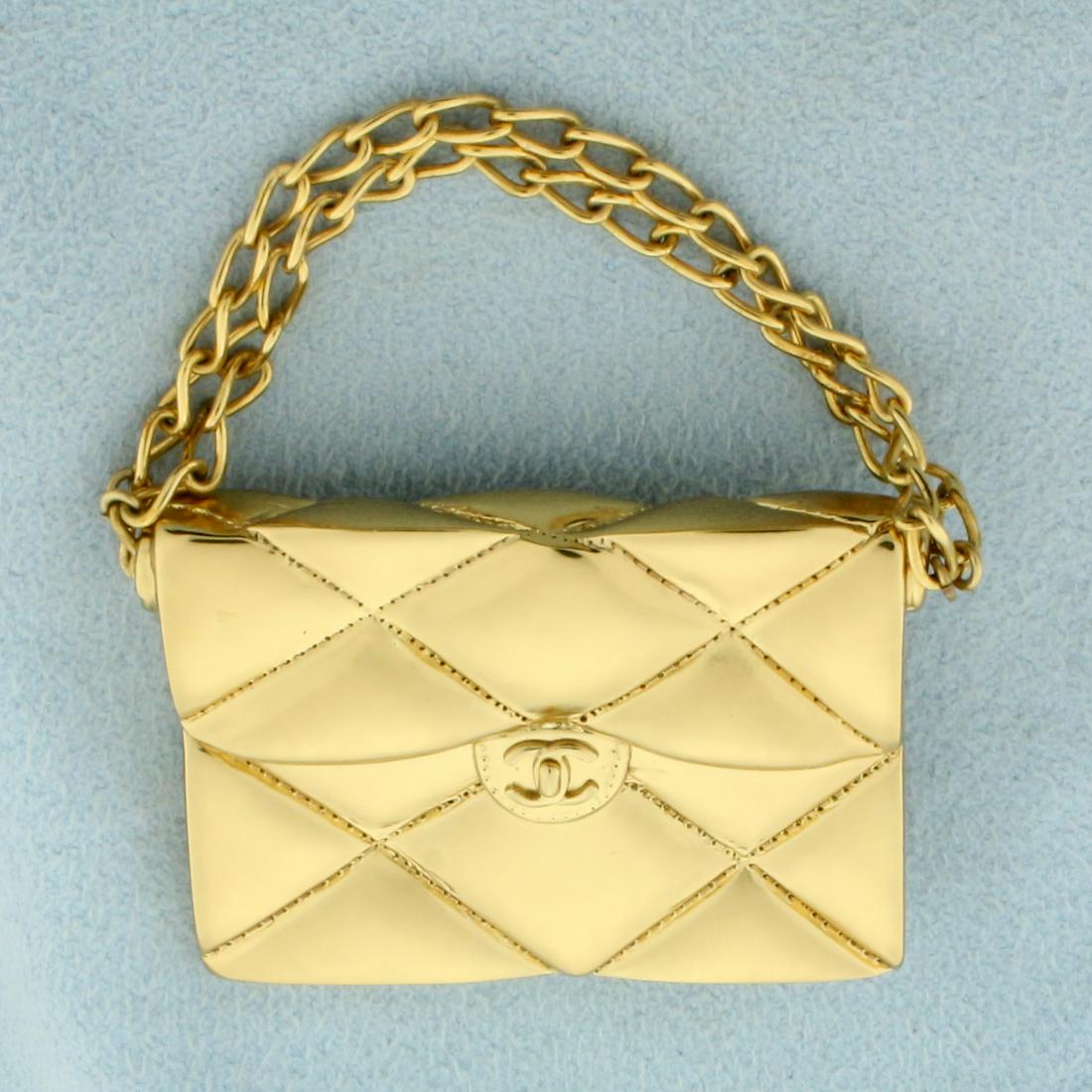 Rare Authentic Chanel Iconic 2.55 Quilted Flap Bag: Guaranteed authentic in mint condition. Shiny gold color with articulting chain straps. Detailed on all sides, even showing accurate stitches on bag. CC turn lock iconic design. Made in France. Rare s
