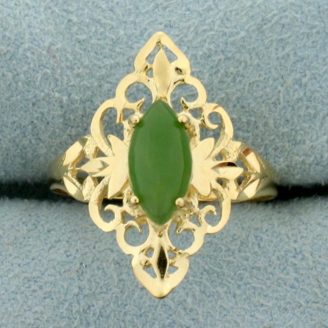 1ct Jade Solitaire Ring in 14K Yellow Gold: In 14K Yellow Gold. Contains one high quality natural 10x5.mm marquise cut Jade gemstone with uniform green color and excellent clarity. Ring is diamond cut for extra sparkle. Size 8. 2.0g