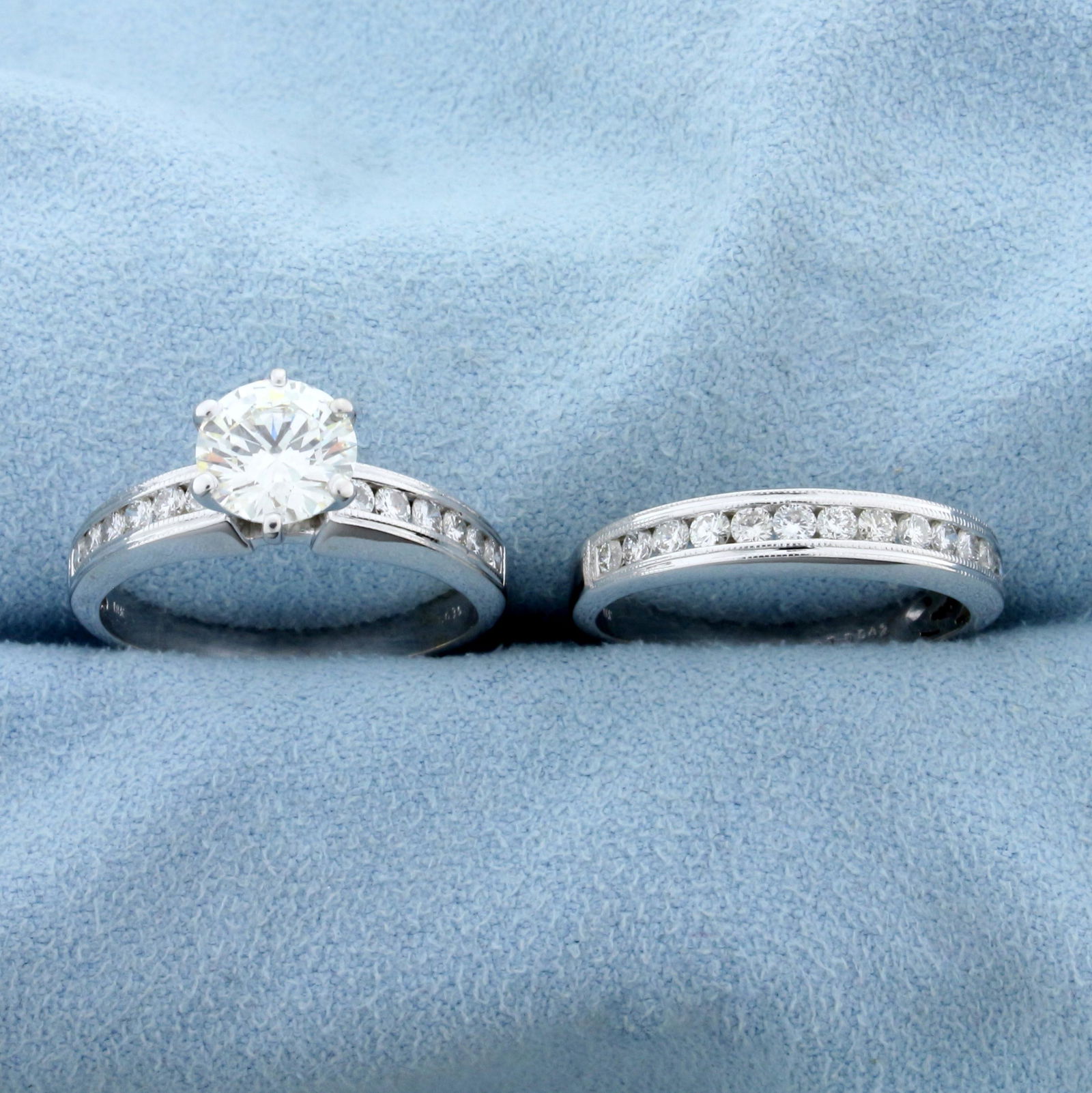 2ct TW Diamond Engagement Ring and Wedding Band Ring: In 18K White Gold. Contains a center high quality 1.33ct round brilliant diamond, VS1 clarity/I color and excellent cut for lots of sparkle. Also contains twelve .03ct round diamonds in shank and band