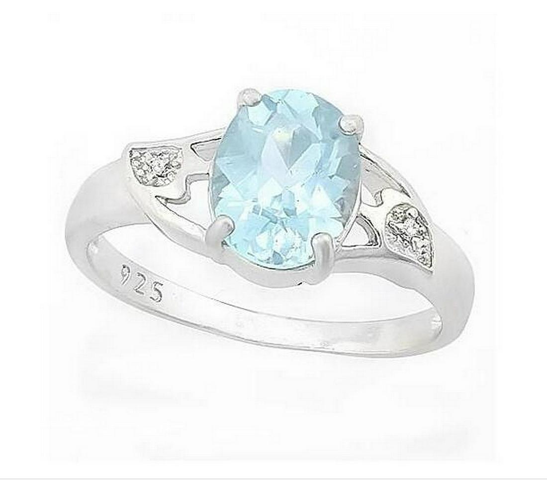 2CT Sky Blue Topaz & Diamond Ring in Sterling Silver: Oval cut 2.02ct sky blue topaz gemstone ring, accented with .01ctw genuine diamonds. Size 8. Set in platinum over sterling silver, 2.6g.