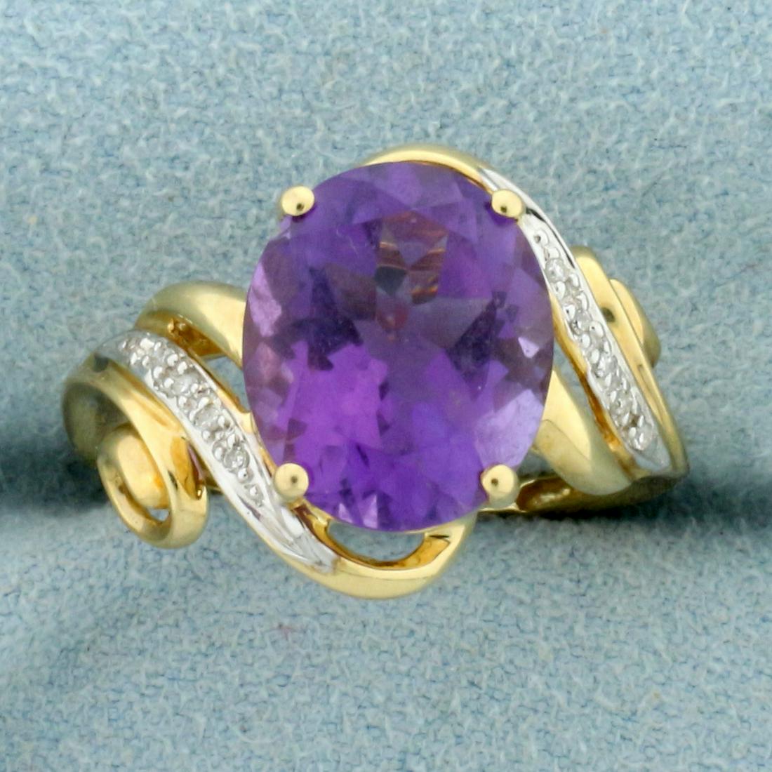 5ct Amethyst and Diamond Ring in 10K Yellow and White: In 10K Yellow and White Gold. Contains one high quality natural 12x10mm oval cut Amethyst gemstone with intense purple color and excellent clarity. Also contains ten high quality 1/2pt Diamonds. Size 