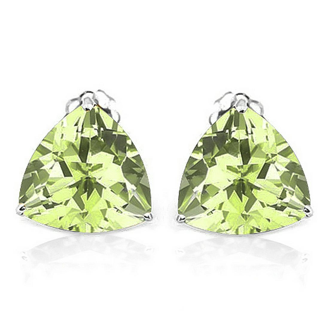 6MM Trillion Cut Peridot Stud Earrings in Sterling: Set in platinum over sterling silver, 3-prong basket mountings with friction backs. Contains 2 trillion cut natural Peridot gemstones with beautiful color. Peridot gemstones measure 6mm each. 1.2g