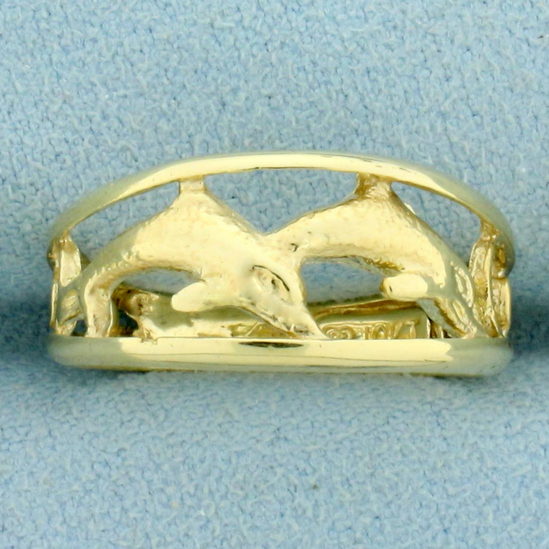 Dolphin Ring in 10K Yellow Gold: In 10K Yellow Gold. 9mm wide. Size 7. 1.9g
