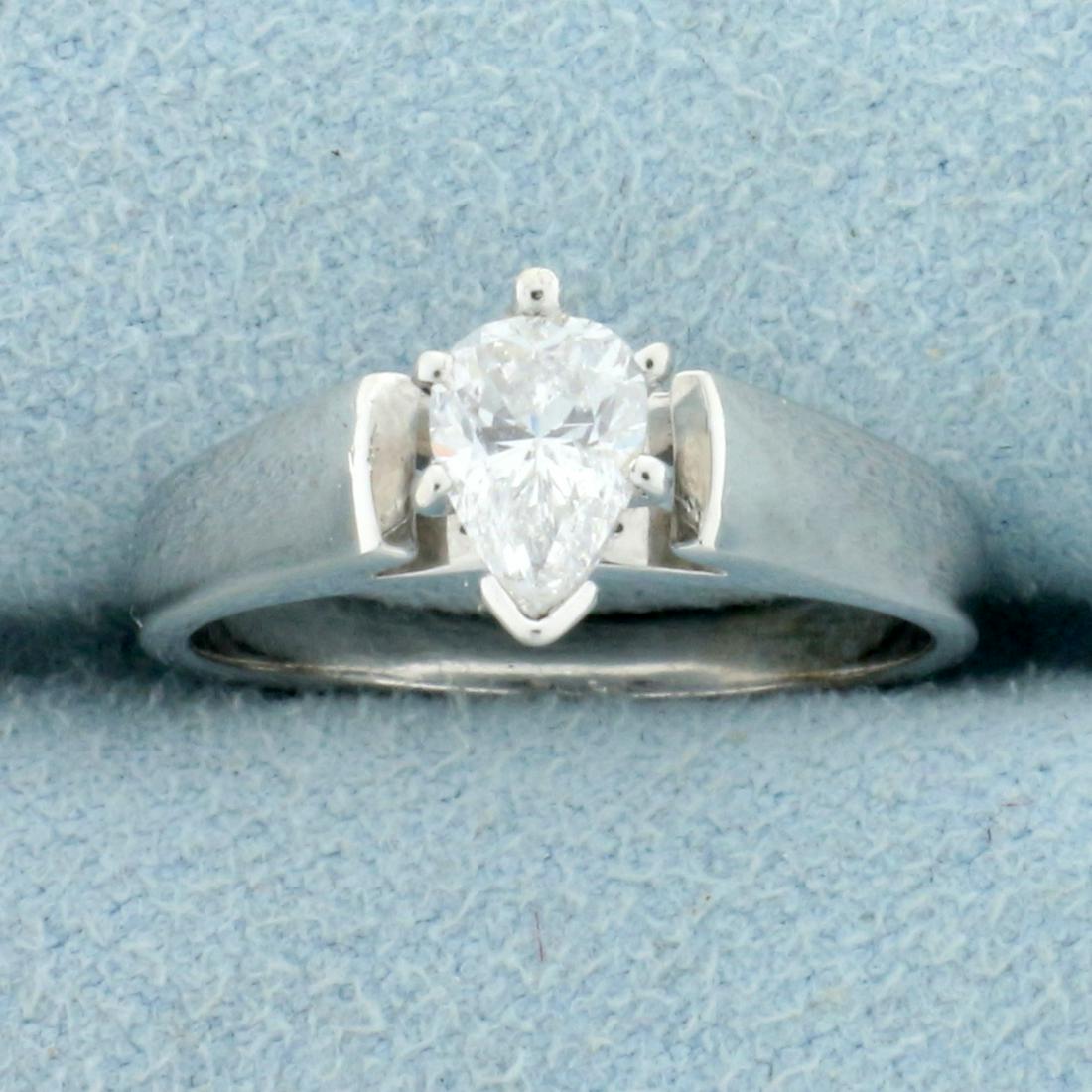 3/4ct Pear Shaped CZ Solitaire Engagement Ring in 14K: In 14K White Gold. Contains a high quality 3/4ct pear shaped CZ with excellent clarity and lots of sparkle. Size 5 3/4. 3.7g.