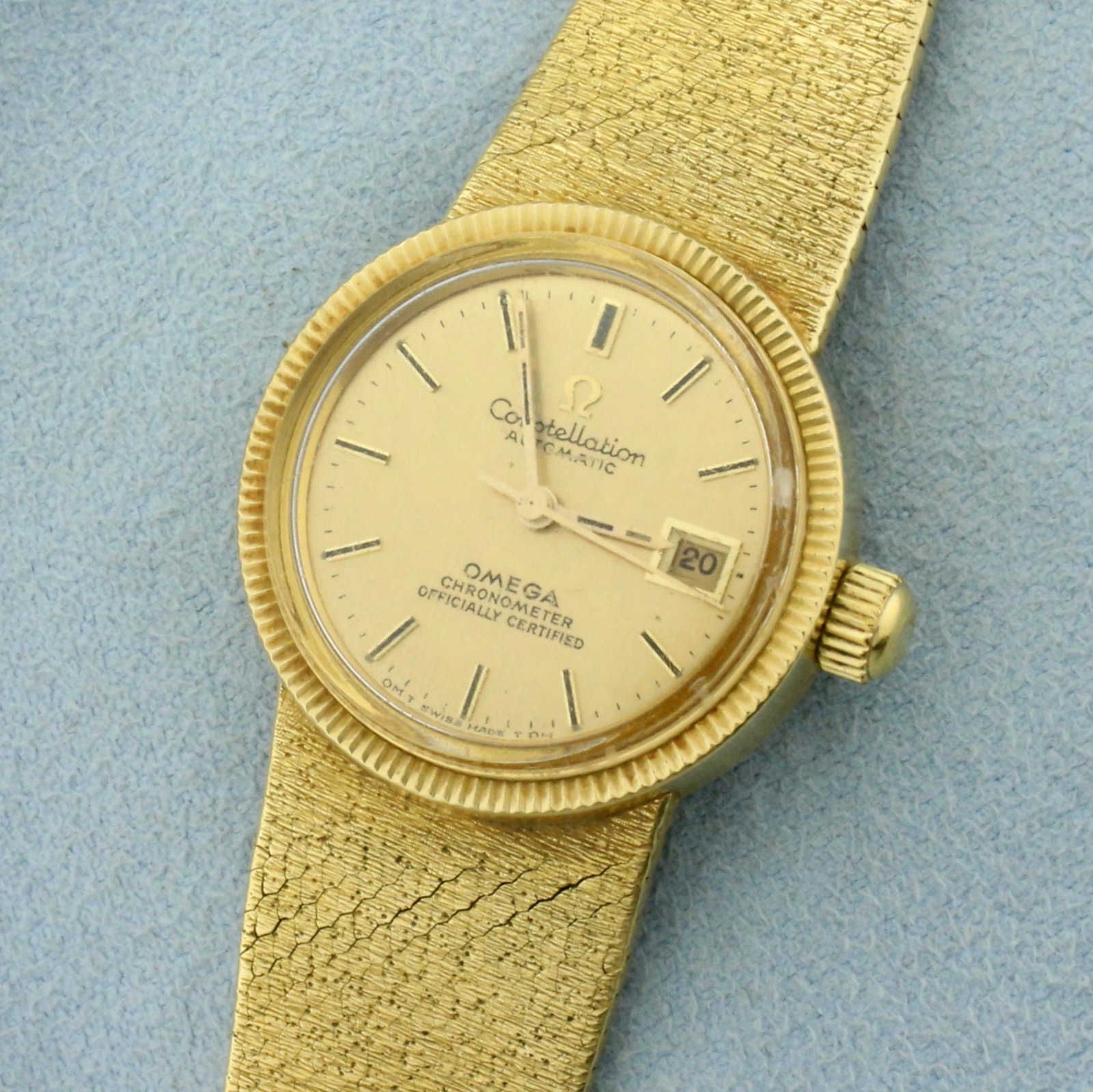 Omega Constellation Automatic Wrist Watch In Solid 18K: Band and Case in Solid 18k Yellow gold. Automatic movement runs great, recently serviced. Watch in great condition, no scratching on crystal. Chronometer Watch. 24mm case. 7 1/4 inches long, 15.7mm wi