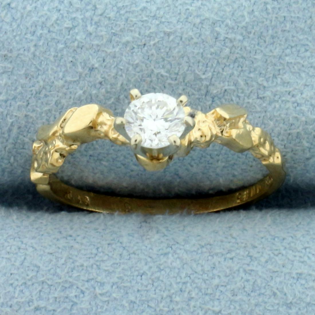 1/3ct Diamond Solitaire Nugget Style Ring in 14K Yellow: In 14K Yellow Gold. Contains one high quality 1/3ct round brilliant cut Diamond, SI clarity/G color, great cut for lots of sparkle. Size 6. 1.g