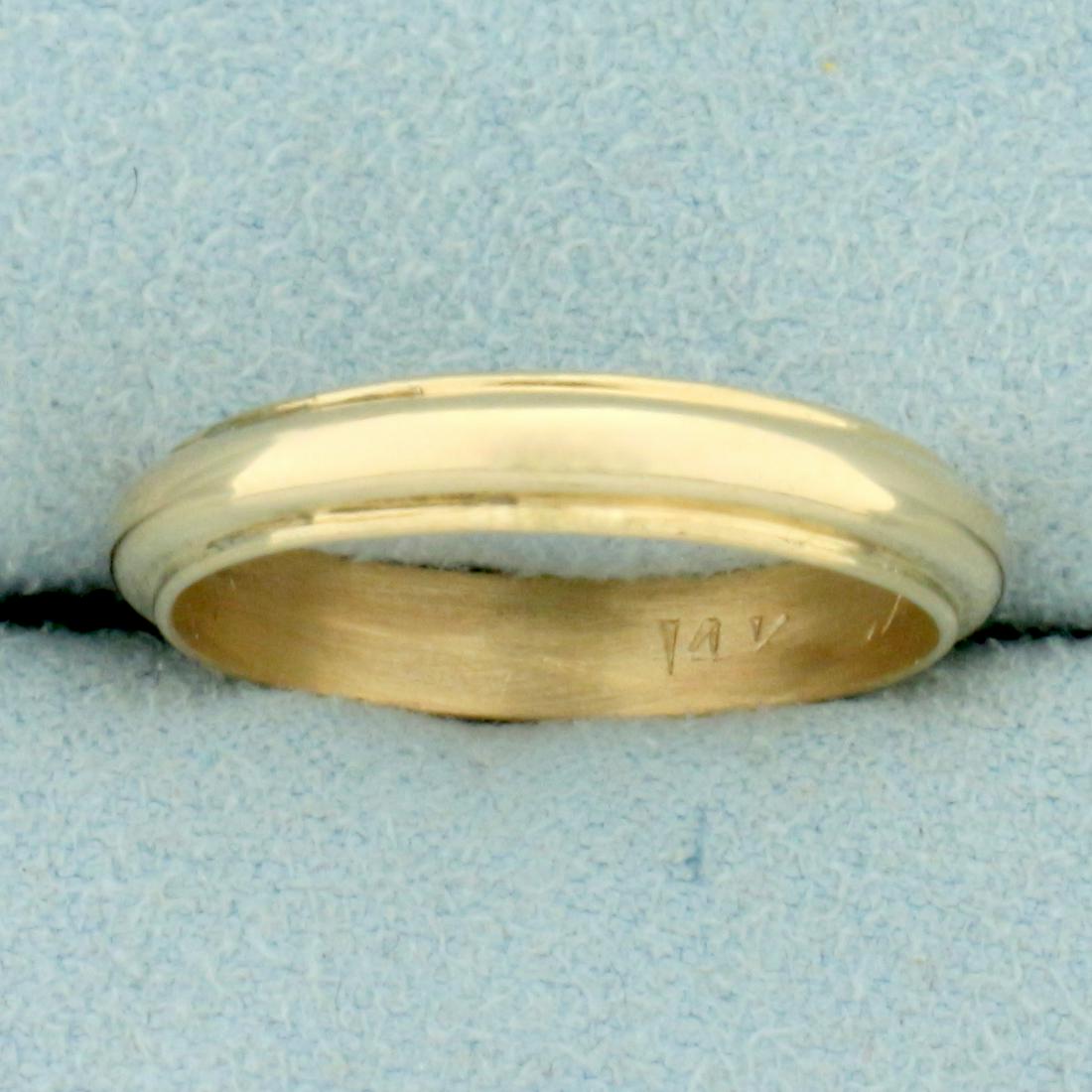 3.7mm Wedding Band Ring in 14K Yellow Gold: In 14K Yellow Gold. 3.7mm wide. Size 7 1/2. 3.0g