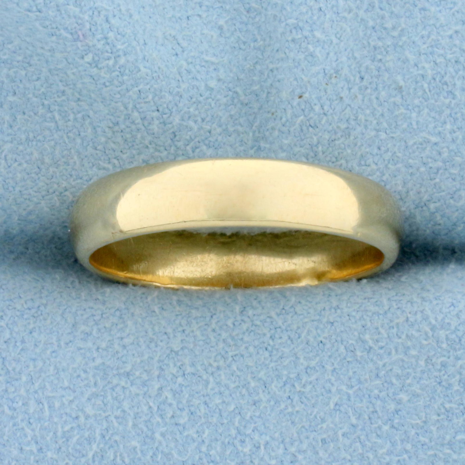 Wedding Band Ring in 14K Yellow Gold: In 14K Yellow Gold. 4.6mm wide. Size 10 1/2. 4.8g.