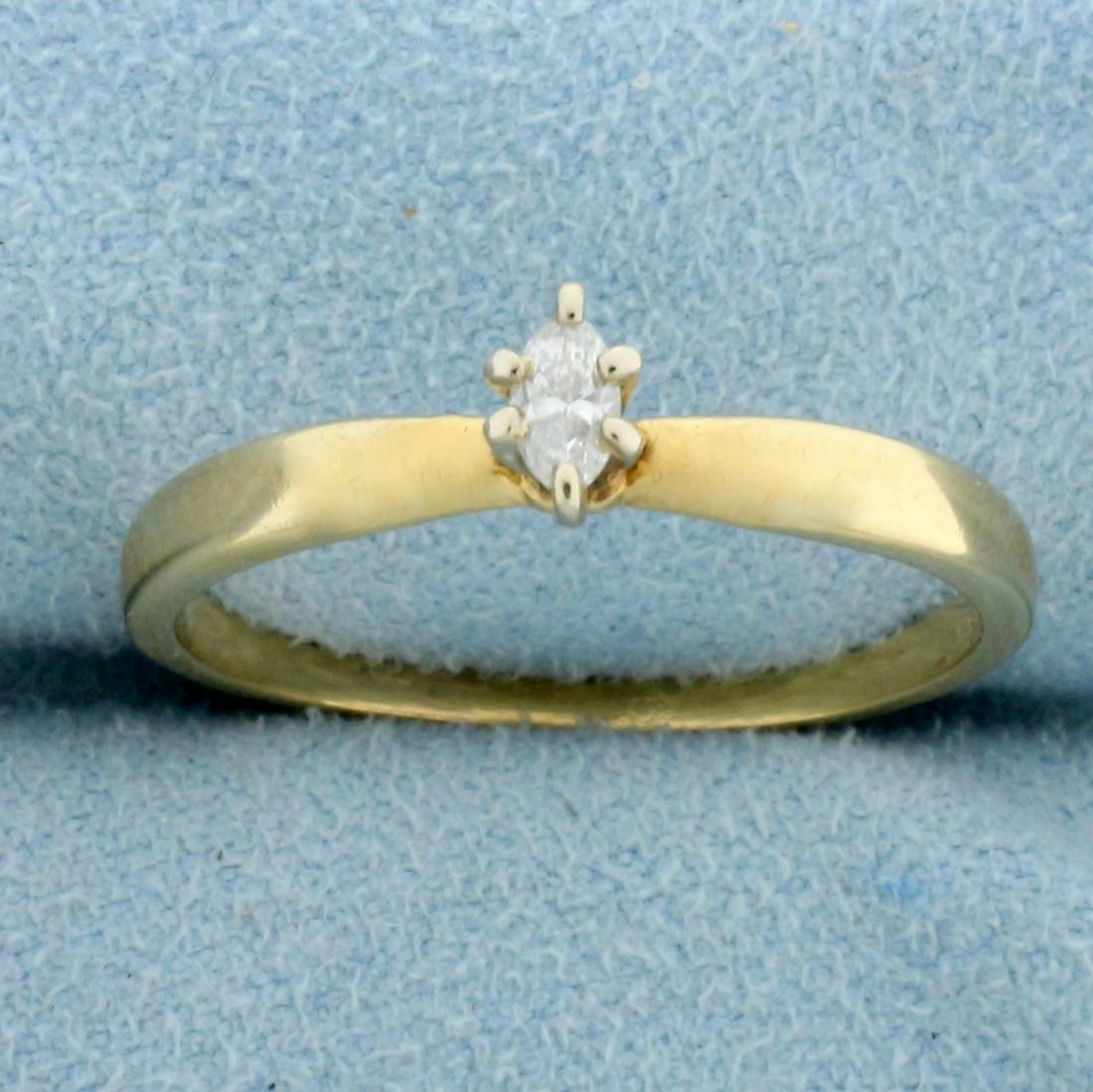 Marquise Solitaire Diamond Engagement Ring in 14K: In 14K Yellow Gold. Contains a high quality 1/4ct marquise cut Diamond, VS clarity/H color, great cut with no black "bowtie" effect and lots of sparkle. Size 10. 2.6g