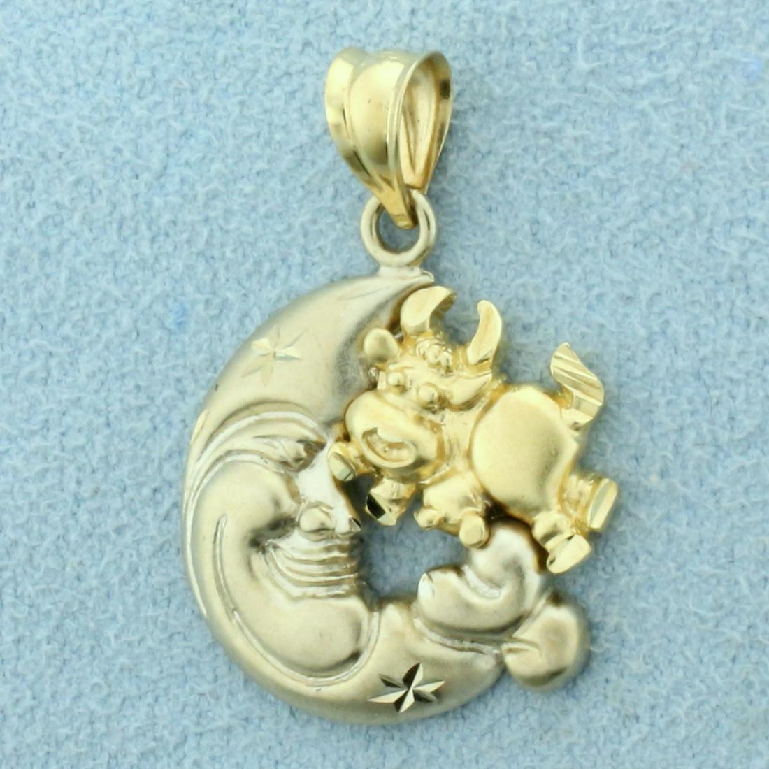 Cow Jump Over The Moon Pendant in 14K White and Yellow: In 14K White and Yellow Gold. 1 inch long including bale. 2.6g.