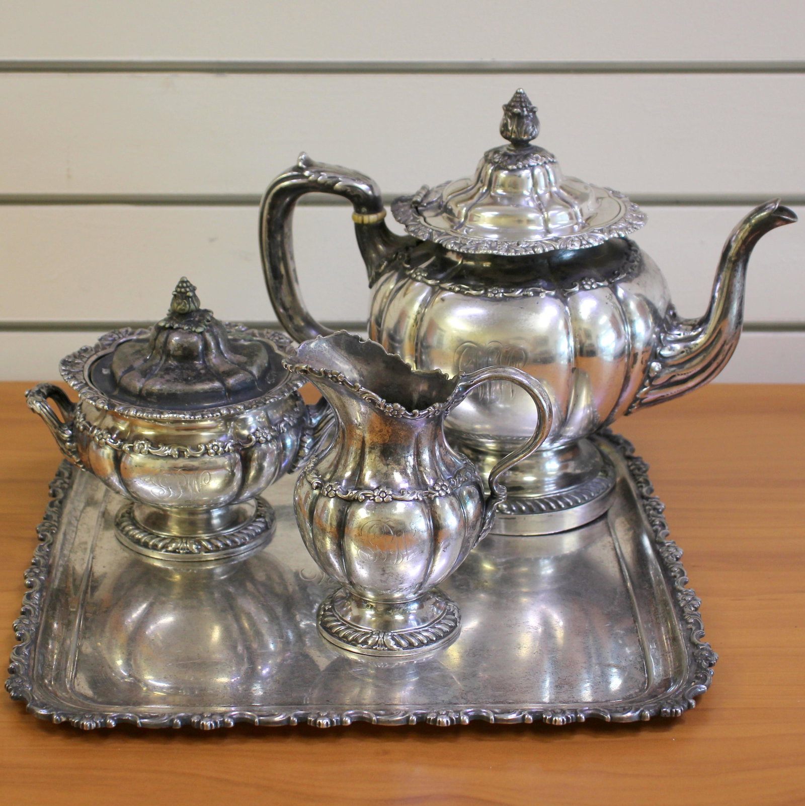 Vintage Tiffany & Co. Four Piece Tea Set: Silver Soldered. With tray, tea pot, sugar bowl, and creamer. Teapot is 9 inches high, 2 1/2 pint. Silver tray is 11 inches wide and 11 inches wide. Creamer is 5 inches in height. Sugar bowl is 5 inch